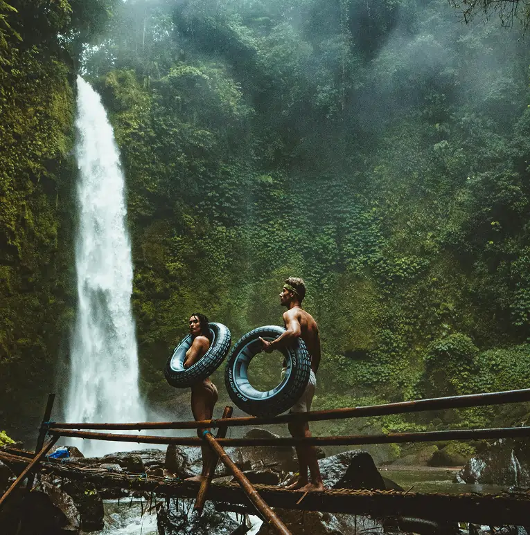 couple by a waterfall